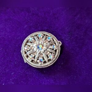 Elegant Silver-Toned Pendant with Crystal Accents